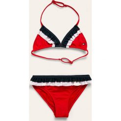 Tommy Hilfiger - Strój kąpielowy dziecięcy 104-164 cm. Czerwone stroje kąpielowe dziewczęce TOMMY HILFIGER, bez wzorów, z elastanu. Za 179,90 zł.