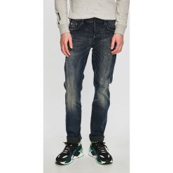 Scotch & Soda - Jeansy Ralston. Niebieskie jeansy męskie Scotch & Soda, bez wzorów. W wyprzedaży za 269,90 zł.