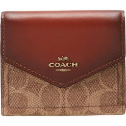 Coach COLORBLOCK SIGNATURE SMALL WALLET Portfel tan rust. Brązowe portfele damskie marki Coach. Za 399,00 zł.