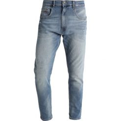 Tommy Jeans MODERN Jeansy Zwężane denim. Niebieskie jeansy męskie Tommy Jeans, z bawełny. Za 509,00 zł.