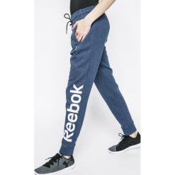 Spodnie sportowe damskie: Reebok – Spodnie