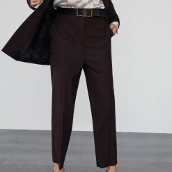 Spodnie garniturowe z wełną - Fioletowy. Fioletowe spodnie damskie Reserved, z wełny. Za 249,99 zł.