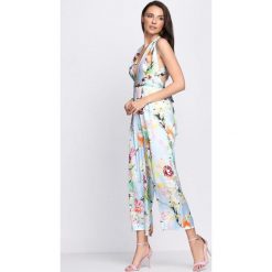 Niebieski Kombinezon Secret Garden. Niebieskie kombinezony damskie na lato Born2be, l. Za 129,99 zł.