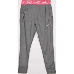Nike Kids - Spodnie dziecięce 122-166 cm. Szare spodnie dziewczęce marki Nike Kids, s, bez wzorów, z poliesteru, sportowe. W wyprzedaży za 139,90 zł.