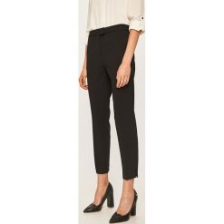 Dkny - Spodnie. Czarne spodnie damskie DKNY, s, z elastanu. W wyprzedaży za 269,90 zł.