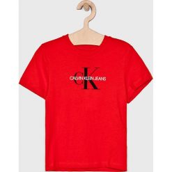Calvin Klein Jeans - Top dziecięcy 128-176 cm. Różowe bluzki dziewczęce Calvin Klein Jeans, z nadrukiem, z bawełny, z okrągłym kołnierzem, z krótkim rękawem, krótkie, bez kaptura. W wyprzedaży za 119,90 zł.