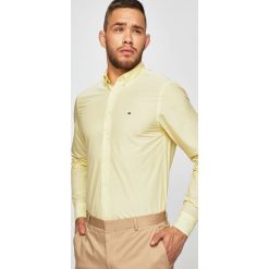 Tommy Hilfiger - Koszula. Różowe koszule męskie TOMMY HILFIGER, s, bez wzorów, z bawełny, casualowe, ze stójką, z długim rękawem. W wyprzedaży za 219,90 zł.