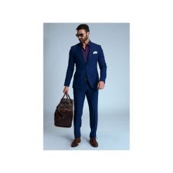 Garnitur Camps Bay. Niebieskie garnitury męskie marki Guns&tuxedos, bez wzorów, z tkaniny. Za 699,99 zł.