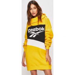 Reebok Classic - Sukienka. Żółte sukienki damskie Reebok Classic, na co dzień, s, z nadrukiem, z elastanu, casualowe, z okrągłym kołnierzem, z długim rękawem, długie, maxi, proste. Za 249,90 zł.
