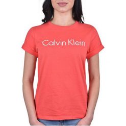 Calvin Klein T-shirt damski SS Top Pink mango QS5789E WM1 (rozmiar S). Różowe koszulki damskie Calvin Klein, s, bez wzorów, z bawełny, bez kołnierzyka, bez rękawów. W wyprzedaży za 122,00 zł.