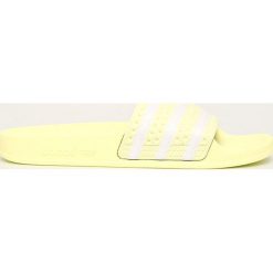 Adidas Originals - Klapki Adilette. Żółte klapki damskie adidas Originals, bez wzorów, z materiału, bez obcasa, na obcasie. Za 149,90 zł.