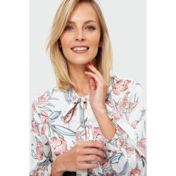Koszula w kwiaty. Bluzki damskie Greenpoint, w kwiaty, z poliesteru, bez kołnierzyka, bez rękawów. Za 49,99 zł.