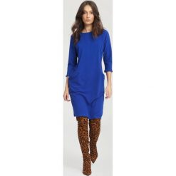 Niebieska Sukienka Docility. Niebieskie sukienki hiszpanki other, l, midi, oversize. Za 79,99 zł.
