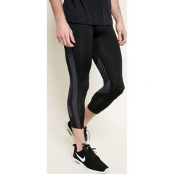 Under Armour - Legginsy. Czarne kalesony męskie Under Armour, xl, z nadrukiem, z elastanu, sportowe. W wyprzedaży za 179,90 zł.