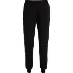 Spodnie dresowe TwinSet 192LI2REE. Czarne spodnie damskie Twinset, m, z elastanu. W wyprzedaży za 269,00 zł.