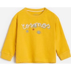 Bluza dresowa z nadrukiem - Żółty. Żółte bluzy męskie Reserved, z nadrukiem, z dresówki, bez kołnierzyka, bez rękawów, bez kaptura. Za 35,99 zł.