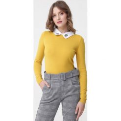 Żółty Sweter Ryann. Żółte swetry damskie Born2be, na zimę, s, z aplikacjami, eleganckie, z długim rękawem, długie, bez kaptura. Za 79,99 zł.