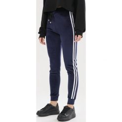 Granatowe Spodnie Calirianne. Niebieskie spodnie damskie Born2be, s, z dresówki. Za 59,99 zł.