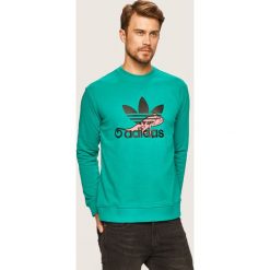 Adidas Originals - Bluza. Bluzy męskie s, z aplikacjami, z elastanu, z okrągłym kołnierzem. Za 269,90 zł.