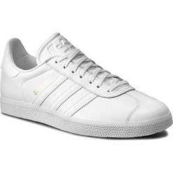 Buty adidas - Gazelle BB5498 Ftwwht/Ftwwht/Goldmt. Białe buty sportowe męskie Adidas, na co dzień, bez wzorów, ze skóry ekologicznej, eleganckie, na sznurówki. Za 399,00 zł.
