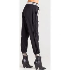 SPODNIE Twinset. Czarne spodnie damskie Twinset, z materiału. Za 299,40 zł.