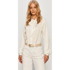 Jacqueline de Yong - Koszula. Niebieskie bluzki damskie Jacqueline de Yong, na co dzień, bez wzorów, z poliesteru, eleganckie, bez kołnierzyka, z długim rękawem. Za 119,90 zł.