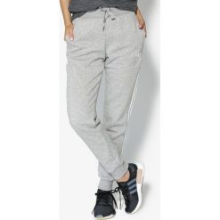 Spodnie sportowe damskie: Adidas Spodnie damskie Originals Cuffed Pants szary r. 36 (CD6915)