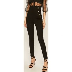 Guess Jeans - Legginsy. Czarne spodnie damskie Guess Jeans, s, z aplikacjami, z elastanu. W wyprzedaży za 379,90 zł.