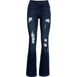 Dżinsy BOOTCUT "destroyed" bonprix ciemny denim. Niebieskie jeansy damskie bonprix, z jeansu. Za 109,99 zł.