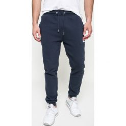 Ellesse - Spodnie. Niebieskie spodnie męskie Ellesse, na co dzień, m, bez wzorów, z bawełny. Za 199,90 zł.