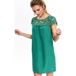 Sukienka z koronkową górą. Zielone sukienki damskie na lato, z tkaniny, eleganckie, krótkie, mini, proste. W wyprzedaży za 59,99 zł.