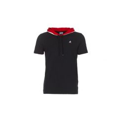 T-shirty z krótkim rękawem Le Coq Sportif TRI Tee Hood. Czarne t-shirty męskie le coq sportif, m, bez wzorów, bez kołnierzyka, krótkie. Za 191,20 zł.