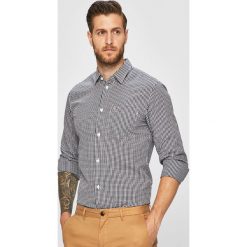 Tommy Jeans - Koszula. Czerwone koszule męskie Tommy Jeans, s, bez wzorów, z bawełny, casualowe, button down, z długim rękawem. W wyprzedaży za 269,90 zł.