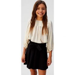 Mango Kids - Koszula dziecięca Elsa 110-164 cm. Białe bluzki dziewczęce Mango Kids, bez wzorów, z wiskozy, z okrągłym kołnierzem, z długim rękawem, długie, bez kaptura. W wyprzedaży za 59,90 zł.