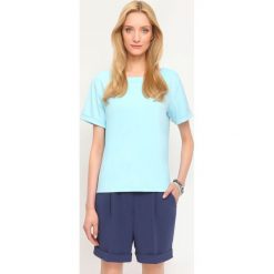 BLUZA NIEROZPINANA DAMSKA GŁADKA. Niebieskie bluzy damskie marki DRYWASH, bez wzorów, z dzianiny, z krótkim rękawem, krótkie, bez kaptura. W wyprzedaży za 59,99 zł.