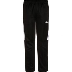 Adidas Performance TIRO Spodnie treningowe black/white. Różowe spodnie chłopięce marki adidas Performance, z dzianiny, z okrągłym kołnierzem. W wyprzedaży za 135,20 zł.