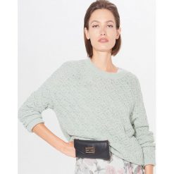 Sweter o ażurowym splocie - Zielony. Zielone swetry damskie Mohito, s, bez wzorów, ze splotem, bez rękawów, bez kaptura. Za 119,99 zł.