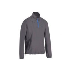 Bluza wiatroszczelna do golfa męska. Niebieskie bluzy męskie marki INESIS, m, z materiału. W wyprzedaży za 59,99 zł.