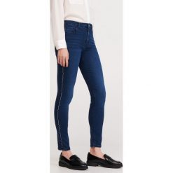 Jeansy slim z lampasami - Granatowy. Niebieskie jeansy damskie Reserved. Za 119,99 zł.