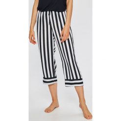 Dkny - Spodnie piżamowe. Niebieskie piżamy damskie DKNY, s, bez wzorów, z poliesteru, bez rękawów. W wyprzedaży za 139,90 zł.