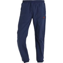 Spodnie dresowe męskie: Ellesse BOLZANO Spodnie treningowe dress blues