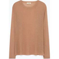 Sweter "Rimofield" w kolorze jasnobrązowym. Pomarańczowe swetry damskie American Vintage, s, bez wzorów, z wiskozy, bez rękawów, bez kaptura. W wyprzedaży za 150,95 zł.