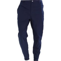 Chinosy męskie: Puma Golf GOLF JOGGER Spodnie materiałowe peacoat