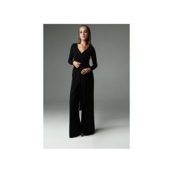 KOMBINEZON FLASH - CZARNY. Czarne kombinezony damskie marki Madnezz, s, w paski, z elastanu, eleganckie, bez kołnierzyka, z długim rękawem, długie. Za 320,00 zł.