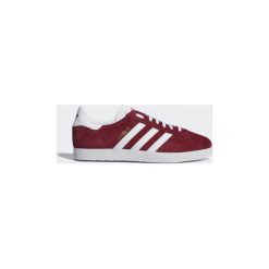 Buty adidas Buty Gazelle. Czerwone trampki i tenisówki damskie marki Adidas, bez wzorów, bez zapięcia. Za 399,00 zł.