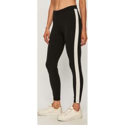 Calvin Klein Jeans - Legginsy. Czarne spodnie damskie Calvin Klein Jeans, s, z aplikacjami, z elastanu. Za 299,90 zł.