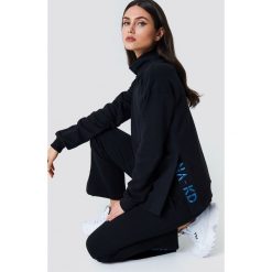 Bluzy damskie: NA-KD Bluza z rozcięciami - Black