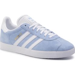 Buty adidas - Gazelle W EE5535 Globlu/Ftwwht/Goldmt. Niebieskie buty sportowe damskie Adidas, na co dzień, bez wzorów, z zamszu, bez obcasa, na płaskiej podeszwie, bez zapięcia. Za 399,00 zł.