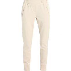 2ndOne SILJA Spodnie treningowe almond. Brązowe spodnie sportowe damskie marki 2ndOne, xs, z dresówki. Za 419,00 zł.