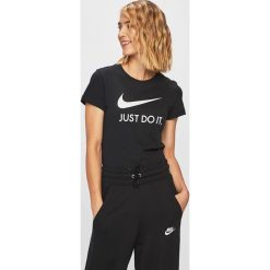 Nike Sportswear - T-shirt. Czarne topy damskie Nike Sportswear, s, z nadrukiem, z bawełny, z okrągłym kołnierzem. Za 119,90 zł.